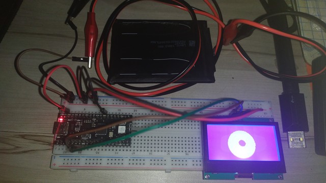 YD-RP2040 board running the donut code.

A battery can be seen connected to the microcontroller.