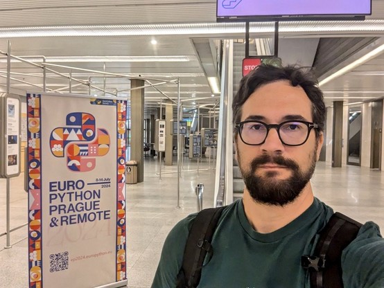 Paolo in front of the conference entrance 