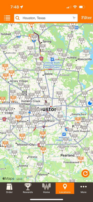 A map of Houston with Whataburger locations overlayed. Open locations are orange, locations that do not have power are gray.