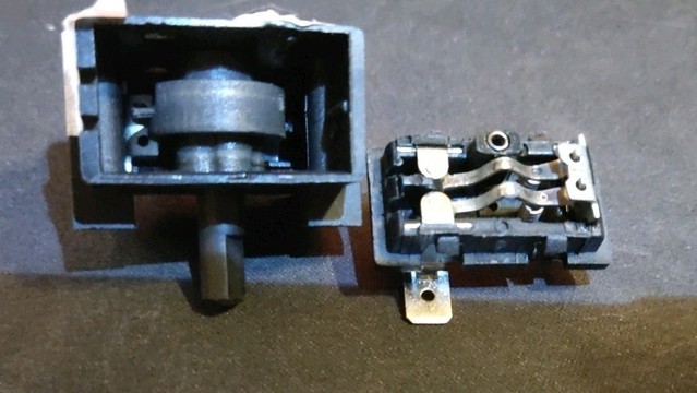 the innards of an electric rotary switch after repairs