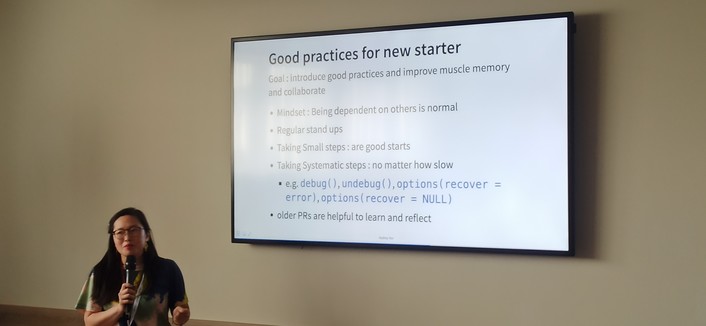 Audrey explaining good practices for new starter