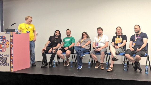 Panel participants on stage