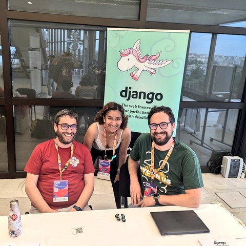 People at the Django booth 