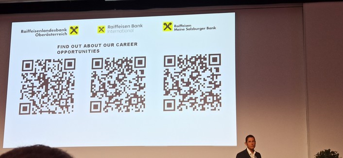 Goran showing QR codes to be hired in the cooperative