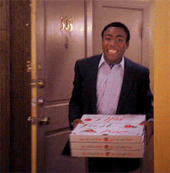 Scene from community when Troy walks in with pizza to see the apartment on fire and his friends in chaos.