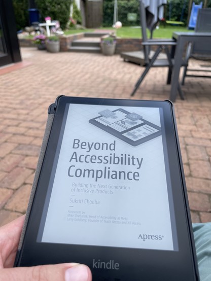 A picture of my eReader showing the cover of „Beyond Accessibility Compliance“ by Sukriti Chadha