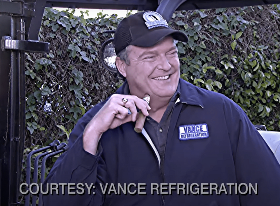 Bob Vance of Vance refrigeration holding a cigarre
