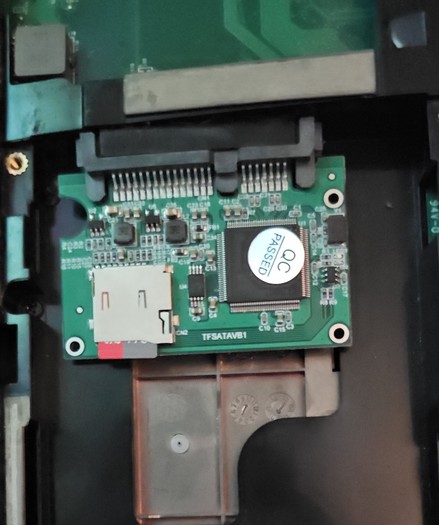 Sata/TF card adapter with a 32GB inserted.