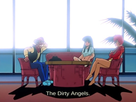 Kei and Yuri from Dirty Pair are speaking with a bald old man. The man says: The Dirty Angels.