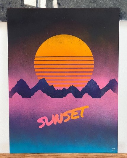 Artwork of a sunset with a large orange sun and purple mountains, featuring the word 