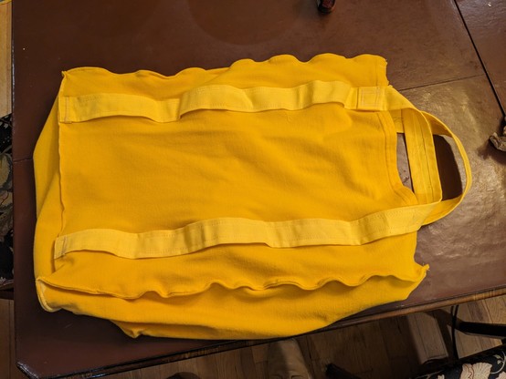 yellow tote bag with more different yellow handles