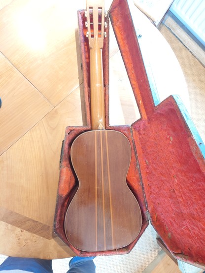 rear of guitar showing striped wood
