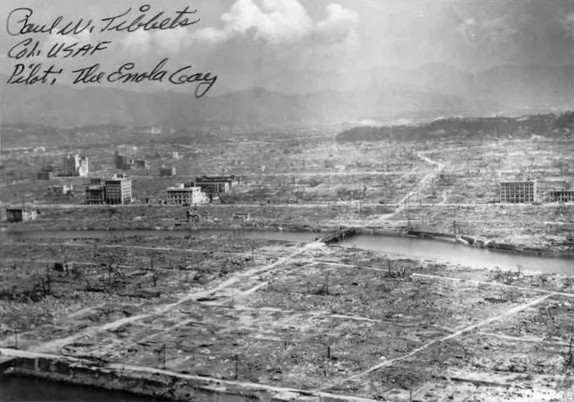 Aerial pic of Hiroshima in the aftermath of the bombing. Sometime after the moment of detonation which occurred at approx 08:15 and 43 seconds (local time), with the writing of Paul Tibbets, the pilot of the Enola Gay.