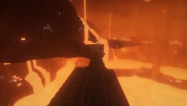 A very safe, definitely OSHA compliant, railway suspended over a lake of lava in Minecraft.