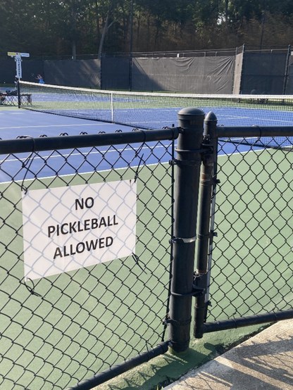 Sign at tennis court reading 