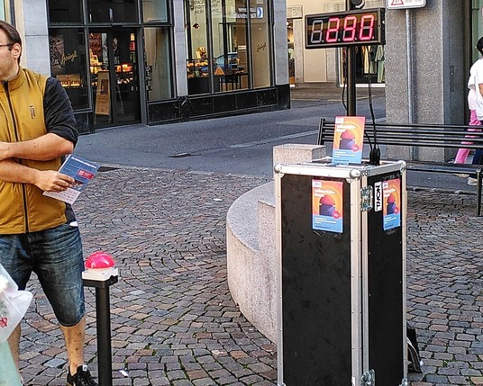 Political street campaign with a push button, counter and siren