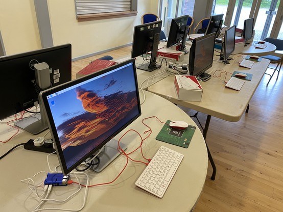 A village hall room set up with Raspberry Pi computers