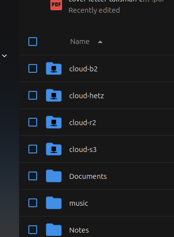 Nextcloud file explorer showing a list of folders, with several 'cloud' folders marked with a network icon indicating external storage: 'cloud-b2' (Backblaze), 'cloud-hetz' (Hetzner object storage), 'cloud-r2' (Cloudflare R2), and 'cloud-s3' (AWS S3).