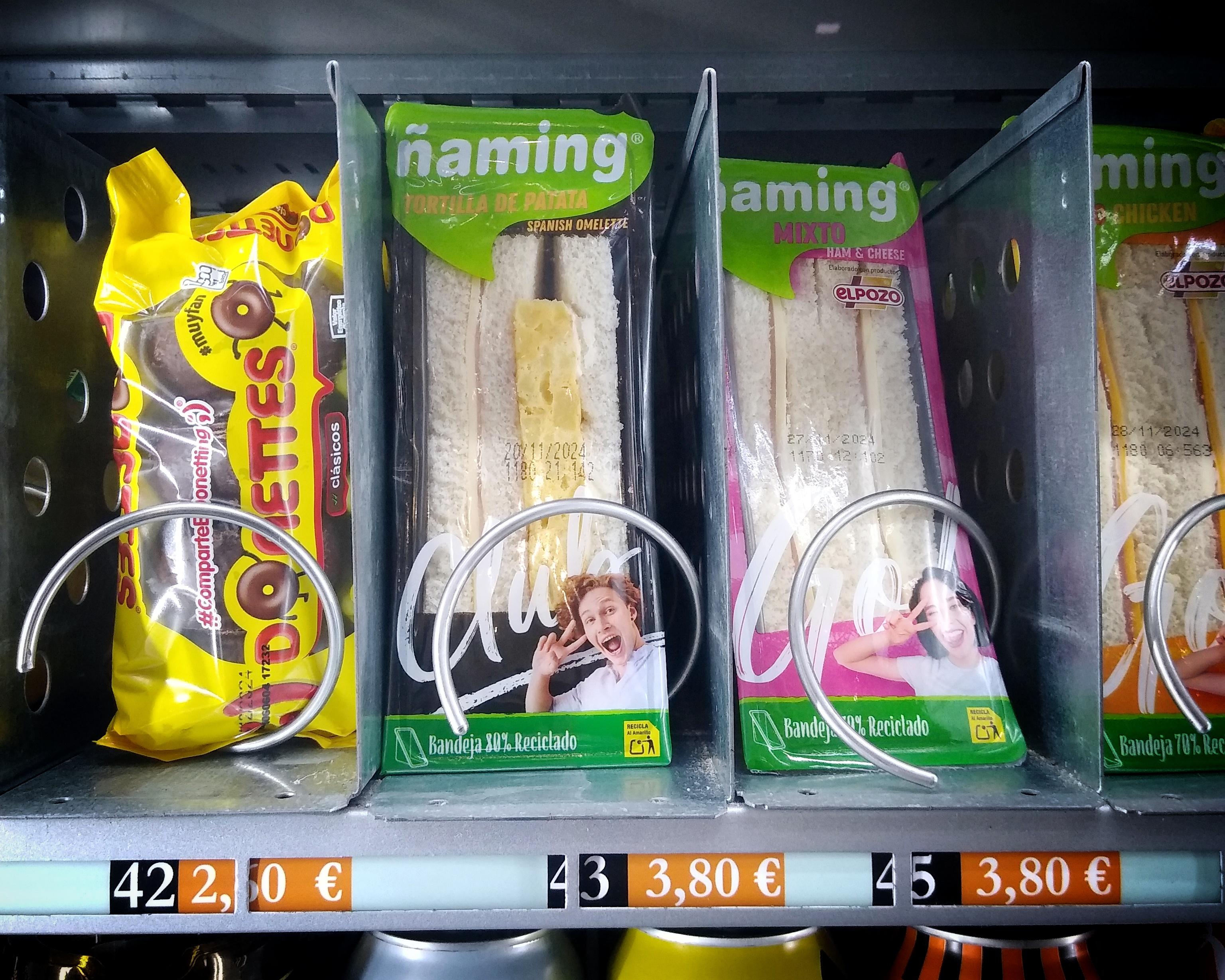 Airport vending machine containing a variety of sandwiches.