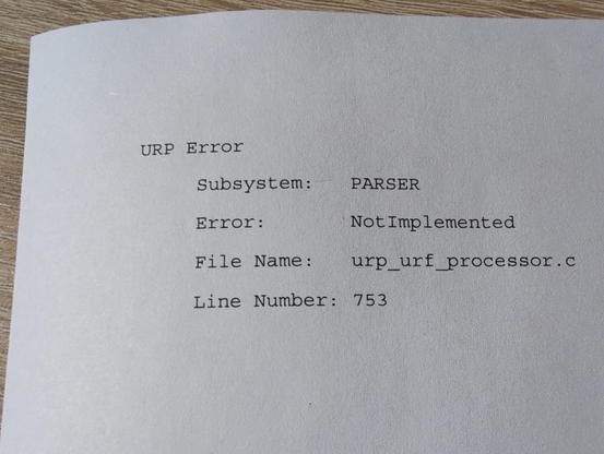 Printed paper that says "URP Error. Subsystem Parser."