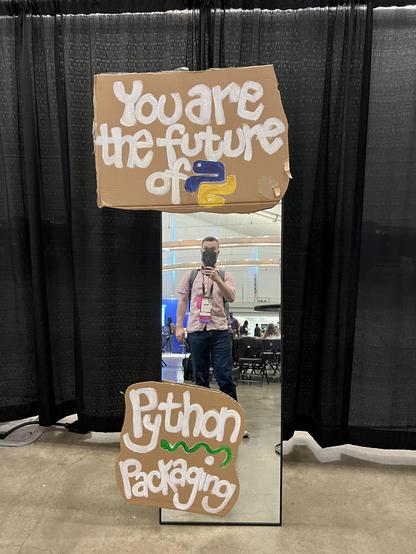 A mirror surrounded by the words "You are the future of Python packaging"