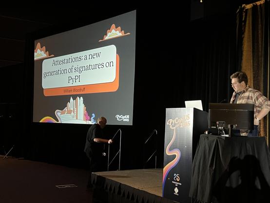 William Woodruff giving a talk "Attestations a new generation of signatures on PyPI"