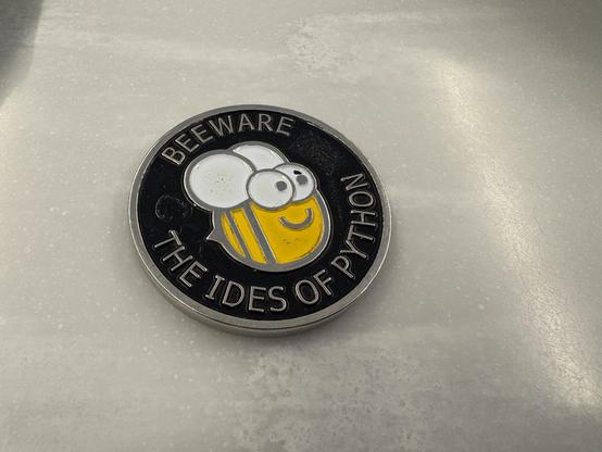 A BeeWare challenge coin.