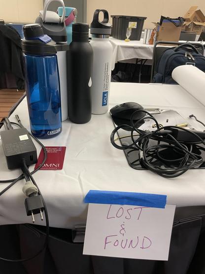 Lost and Found pile on a table at PyCon US