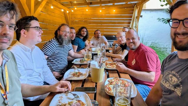 People having dinner together