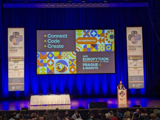 Artur Czepiel at the opening plenary for EuroPython 2025.