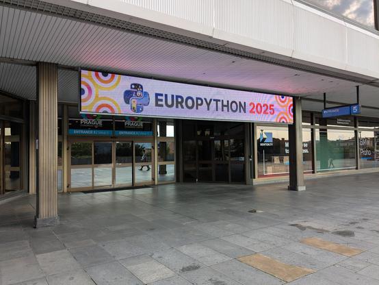 Picture of the outside of the conference center, showing the EuroPython banner.