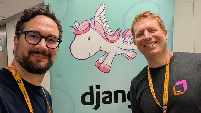 Me and Will in front of the Django banner 