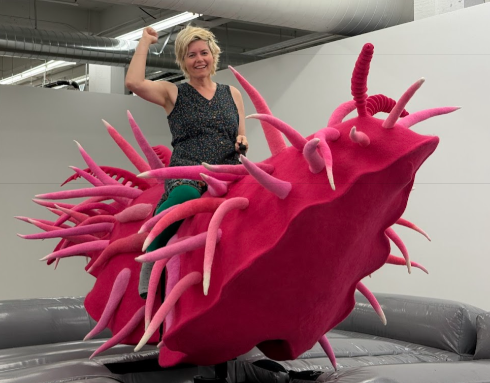 Pamela riding a nudibranch