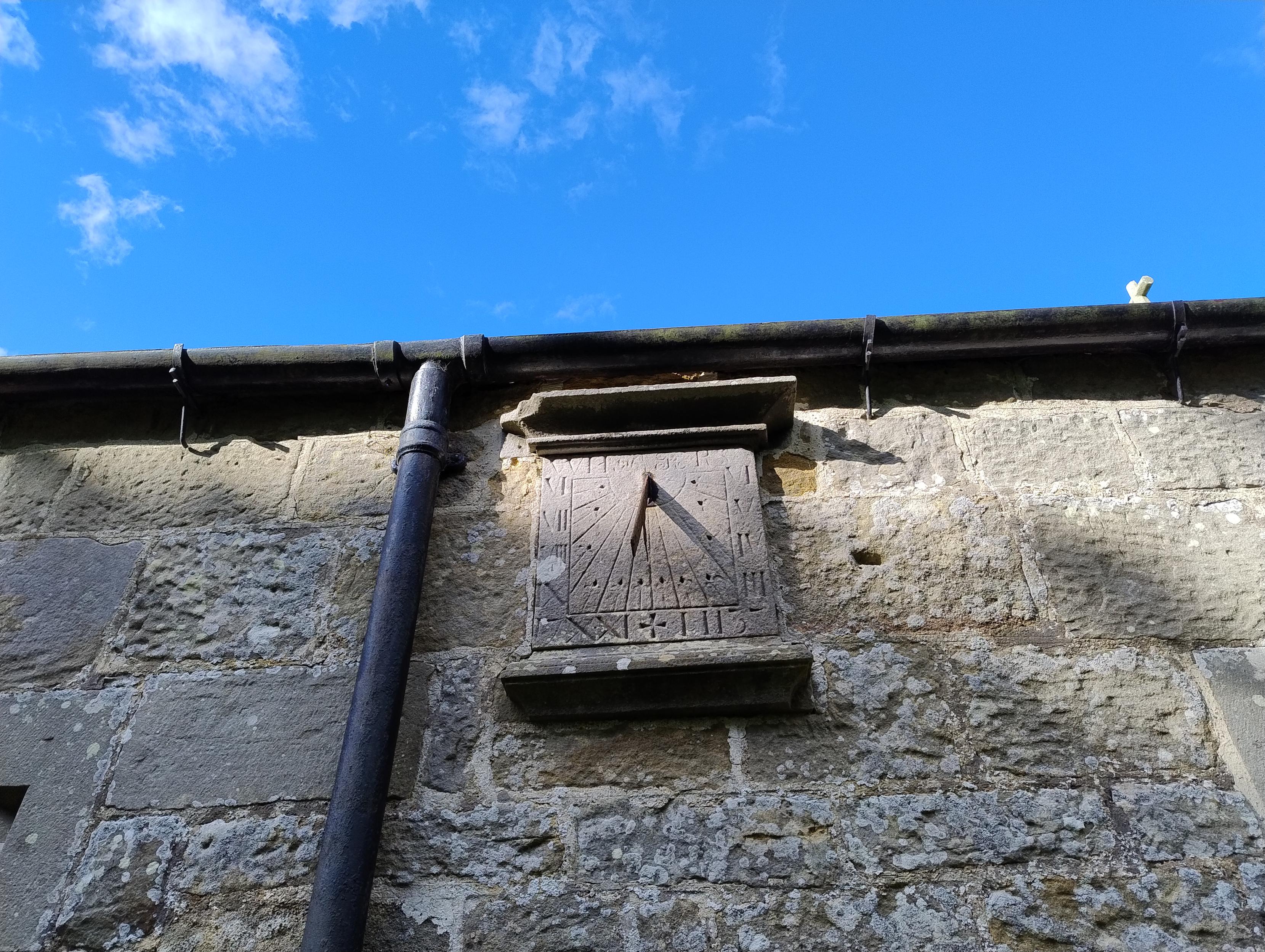 Sundial on an old chapel wall. Appears to be showing around 3pm...ish. 