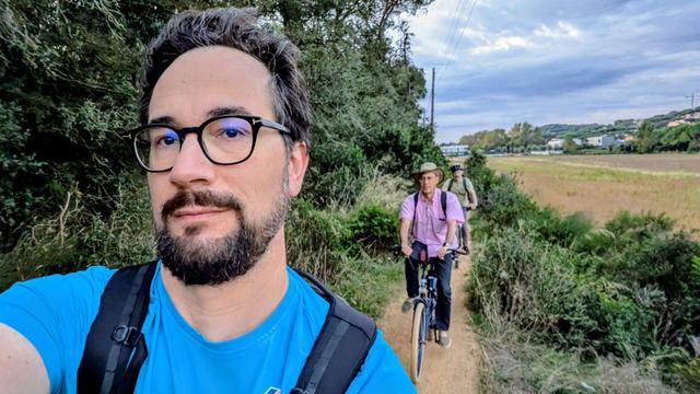 People cycling in the countryside 