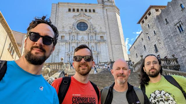 People in front of an old church