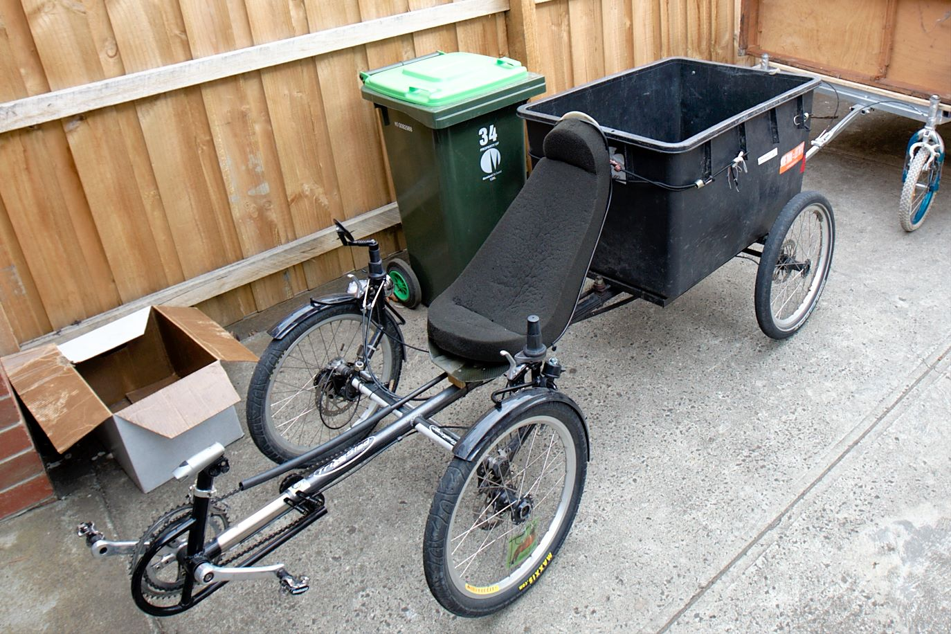 photo of a four wheel recumbent bike.