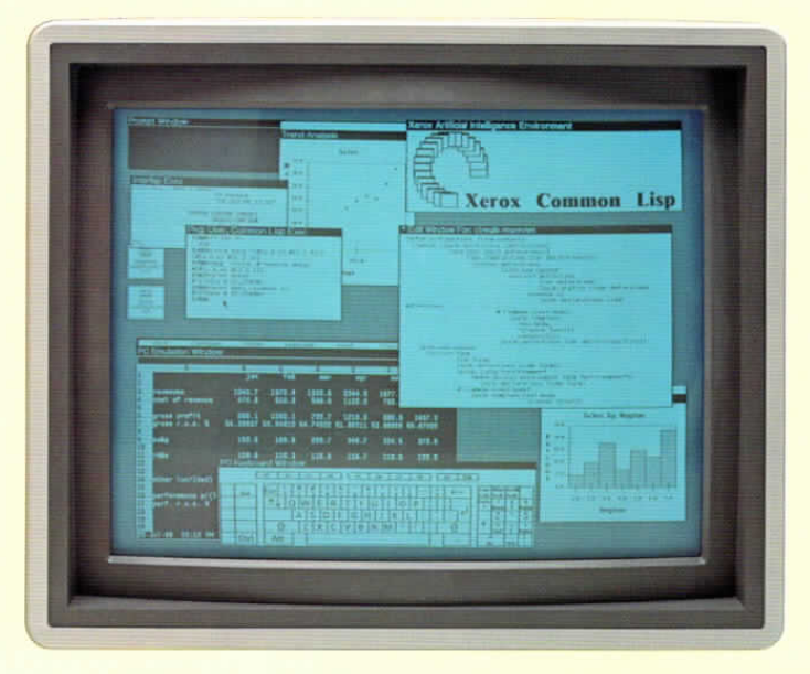 Screenshot of the black and white desktop of a 1980s graphical workstation environment. The desktop has a gray background pattern and several windows with a white background and a title bar with white text on a black background. The windows display Lisp source code, icons, scientific and business charts, a spreadsheet program, a virtual keyboard, and other graphical elements.