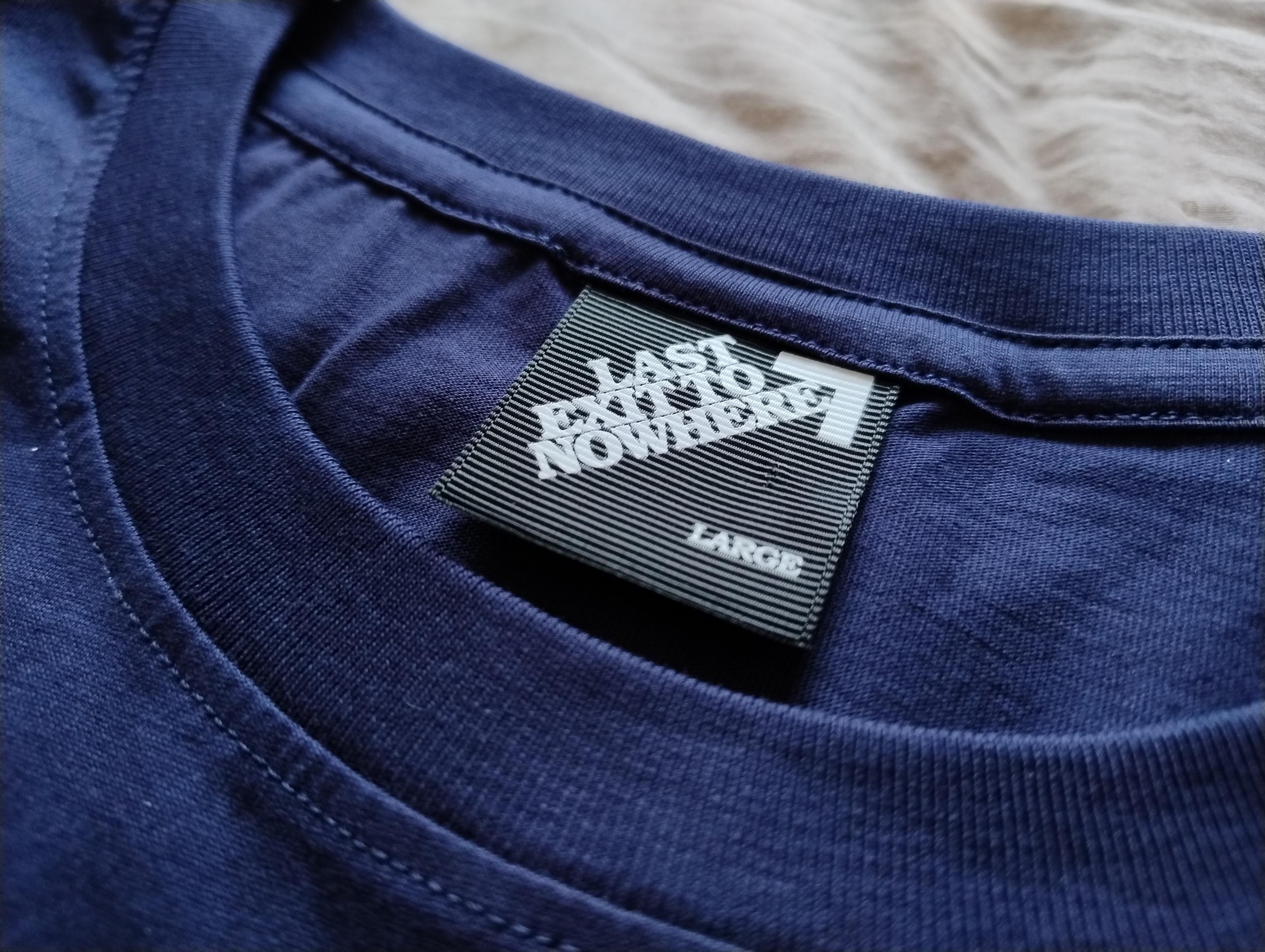 T-shirt label, reads: last exit to nowhere.
