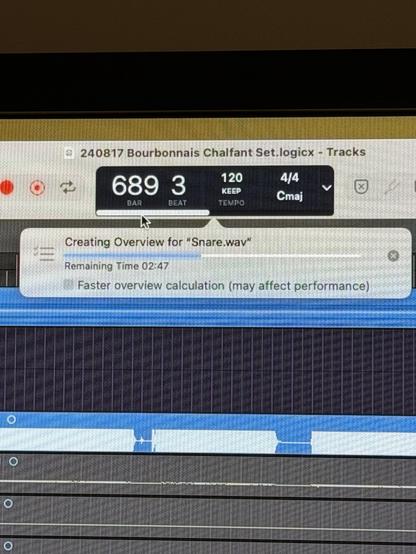 Screenshot of a music production software with a wave form and a pop-up window saying "Creating Overview for "Snare.wav""