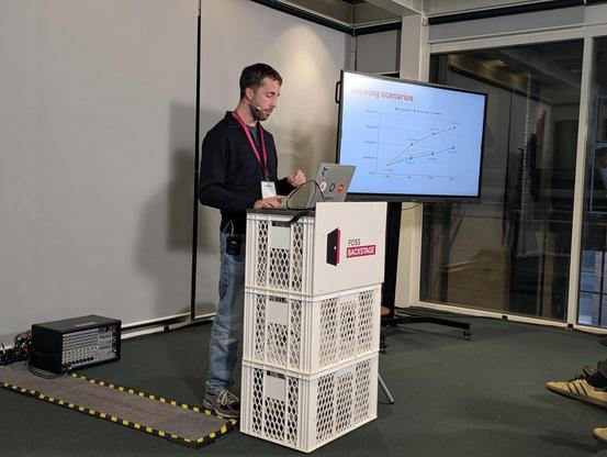 Nil Homedes presents Decidim at FOSS Backstage