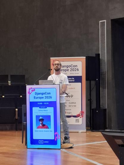 Carlton Gibson on the Django Con Europe stage.