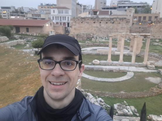 Mariusz face with some ancient Greek ruins behind