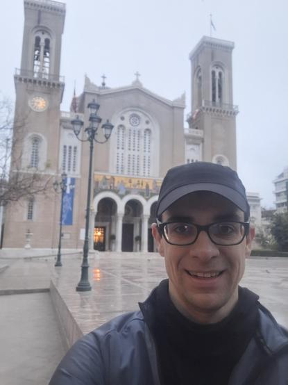Mariusz and the Christian Ortodox church behind him