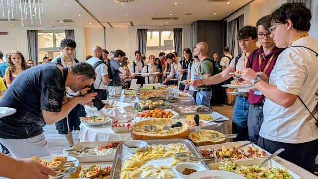 People with a table with food