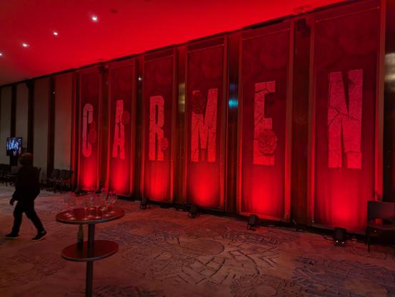 Red lit stage decoration for Carmen at the Artscape theatre