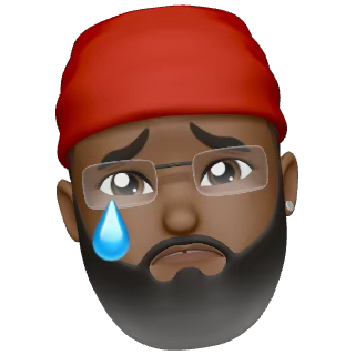 A Memoji of Kojo, shedding a tear. 
An image of a person's face with dark skin against a black background. The person is wearing a red beanie and transparent-rimmed glasses. They have a dark beard and mustache, with eyebrows and a mouth that are downturned. A single, large, blue teardrop hangs from one eye.