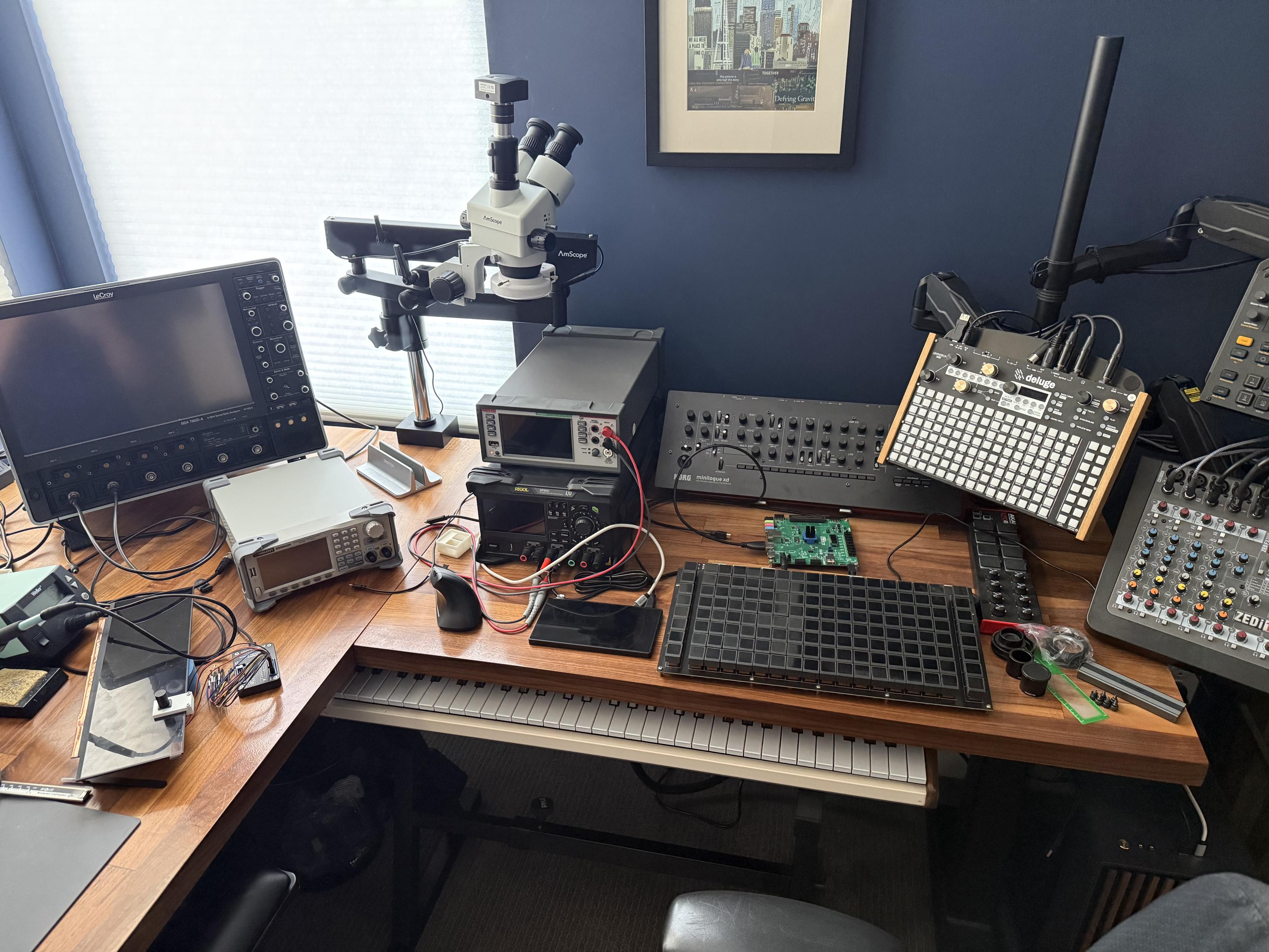 Before photo showing how the equipment took up lots of desk surface without the riser