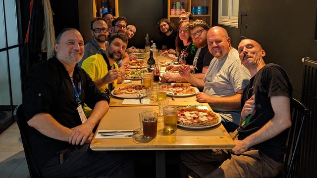People having a pizza