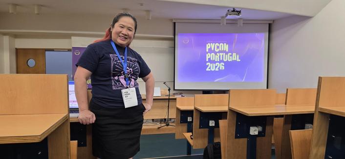 Mariatta at PyCon Portugal Auditorium.